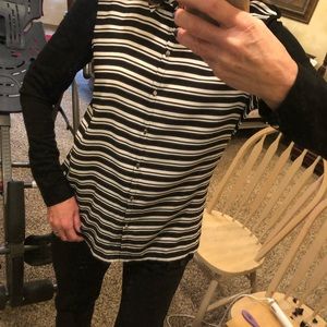 Women’s black and white top.  Size M.  Silver buttons.  Black back.